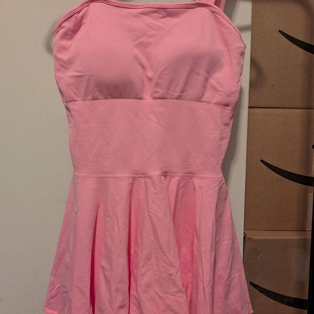 Pink mini dress with built in bra and skorts, size L.